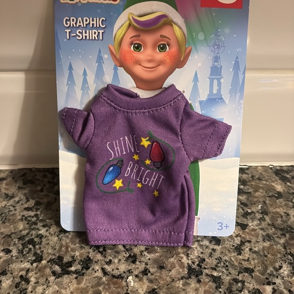 Elfmates (elf on the shelf)
Shine bright, purple graphic T-shirt new - Picture 4 of 5